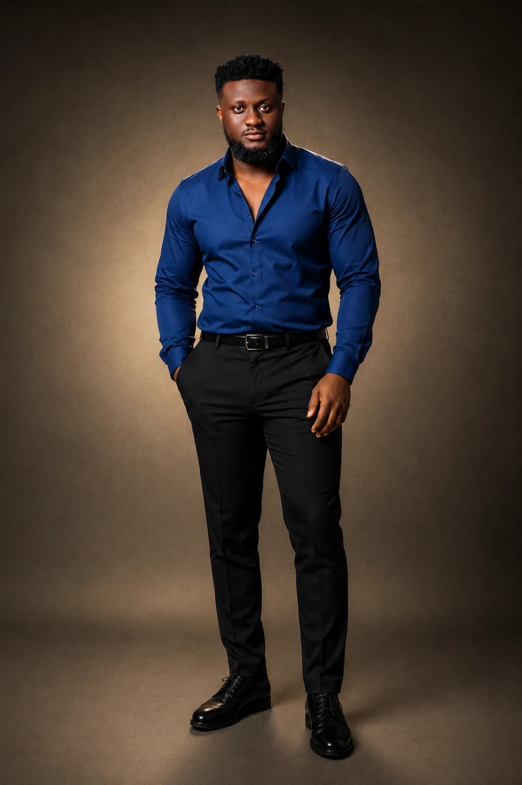Ahn-TiYe in a blue dress shirt against a warm brown background